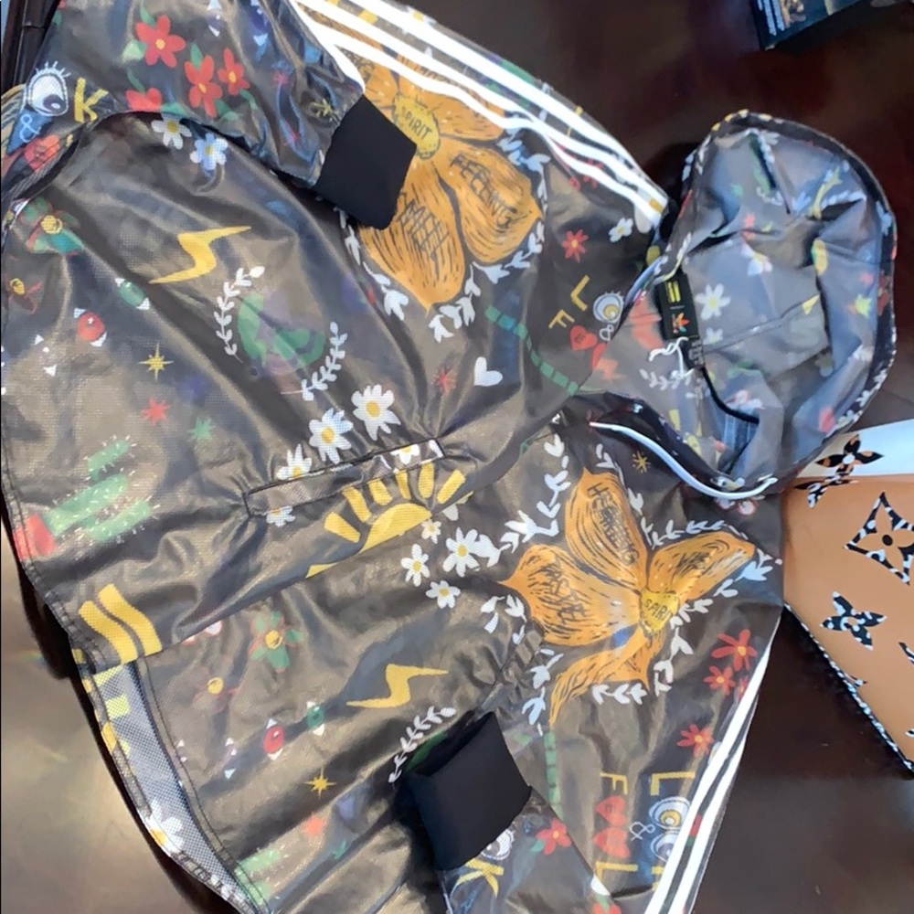 Pharrell Williams adidas floral rain poncho